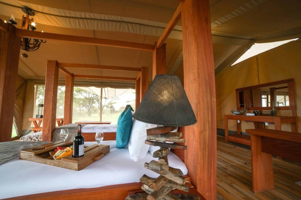 Luxurious bedding setup inside Asanja Grumeti