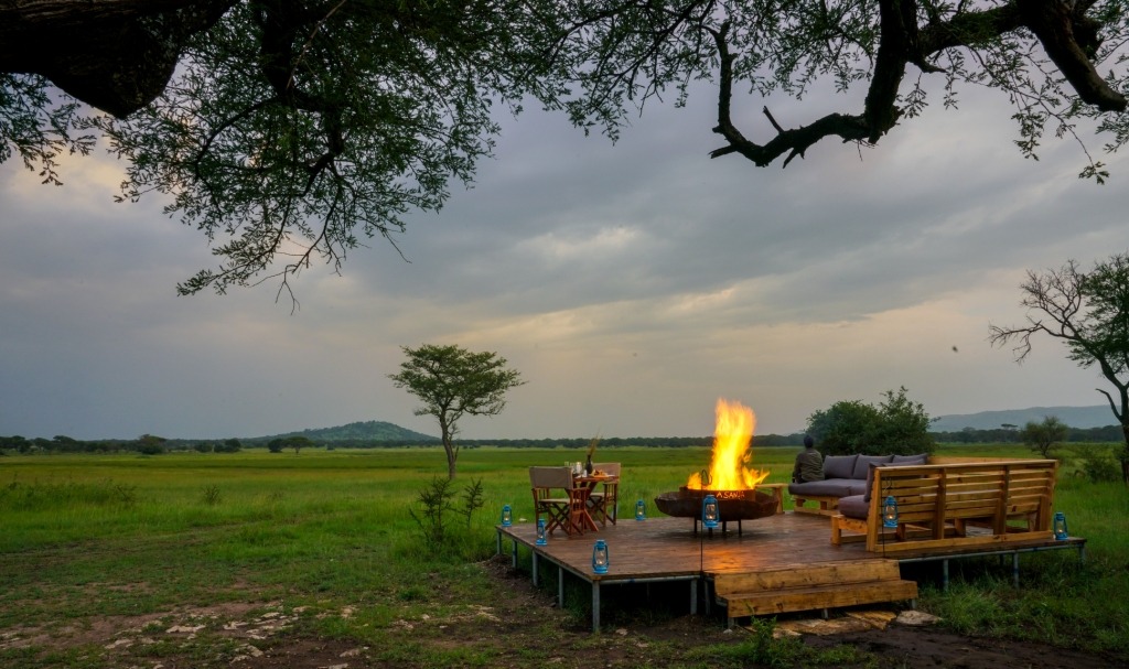 Private veranda view over the Nyasarori plains at Asanja Grumeti