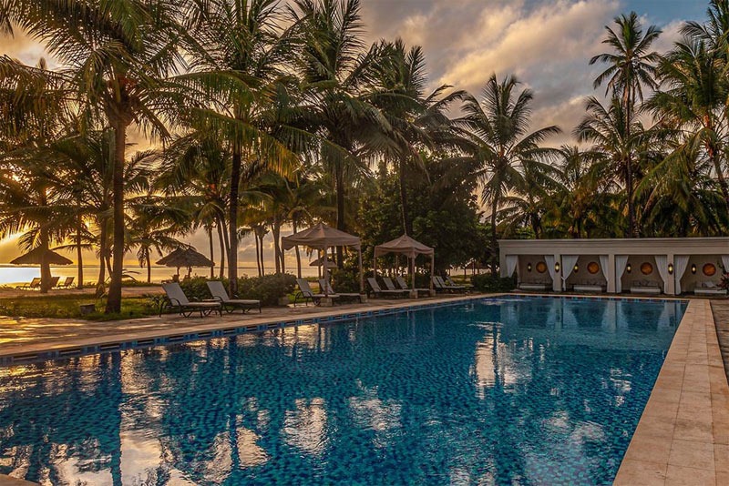 Beachfront view with lounge chairs at Baraza Resort & Spa