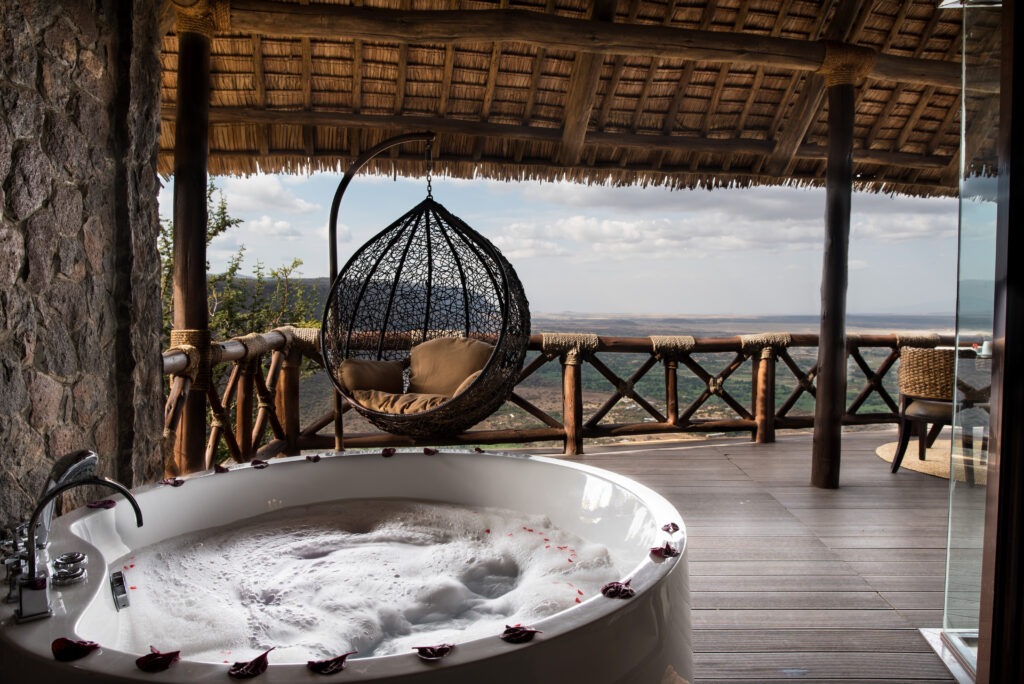 Elegant lounge area with traditional African decor at Kilimamoja Lodge