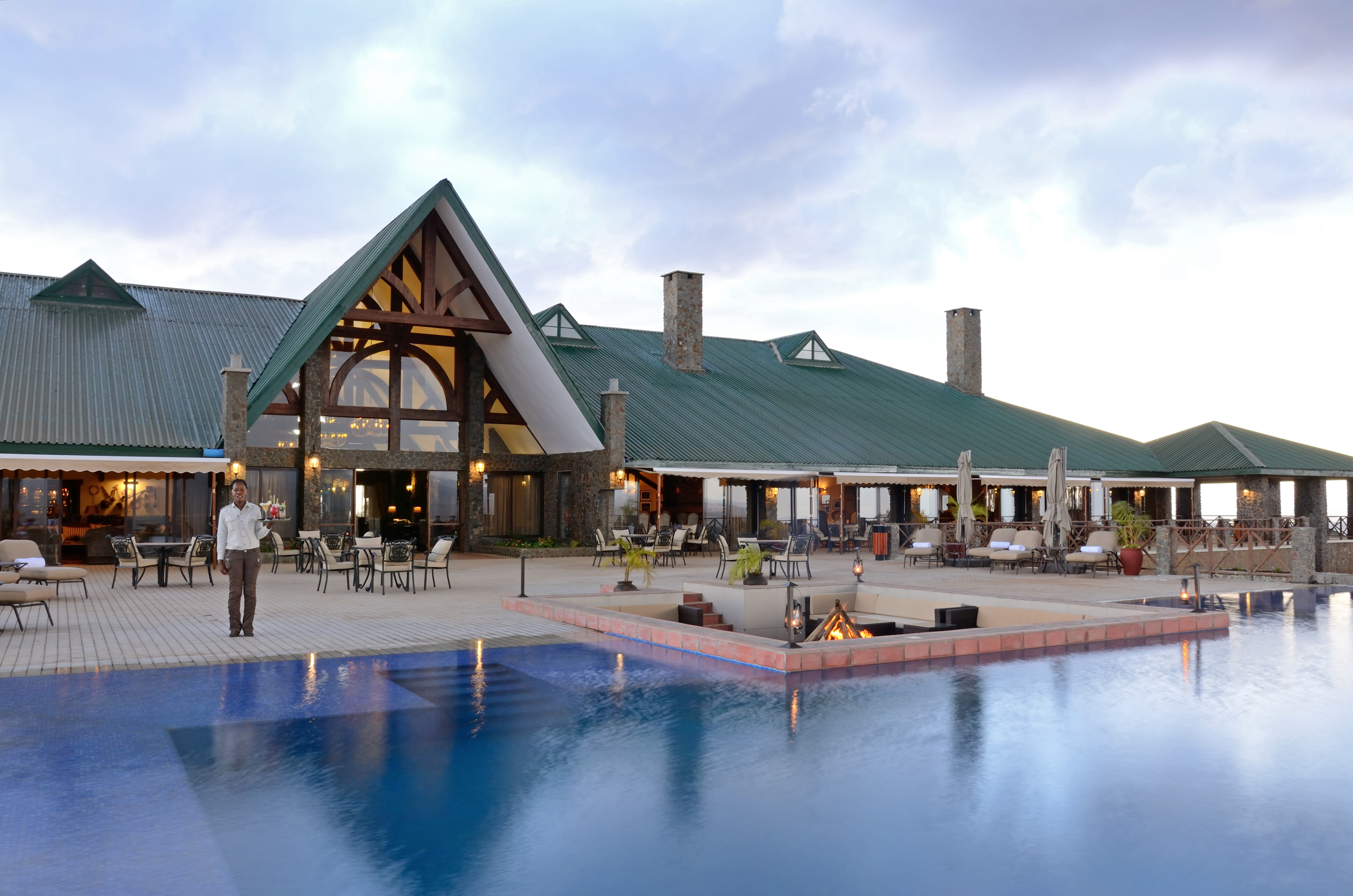 Luxurious suite interior with stunning views at Ngorongoro Oldeani Mountain Lodge