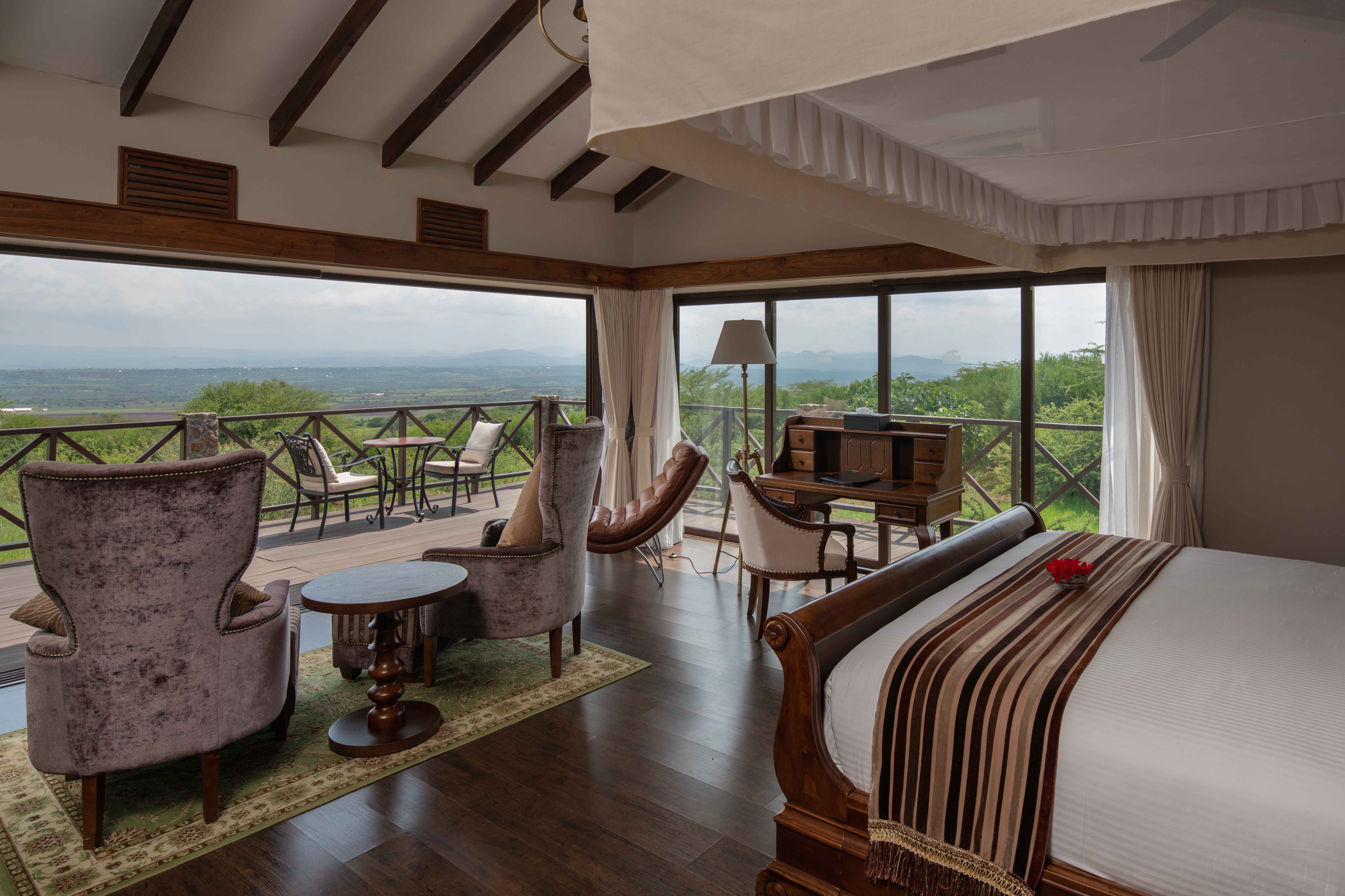 Main lodge building or dining area with panoramic windows at Ngorongoro Oldeani