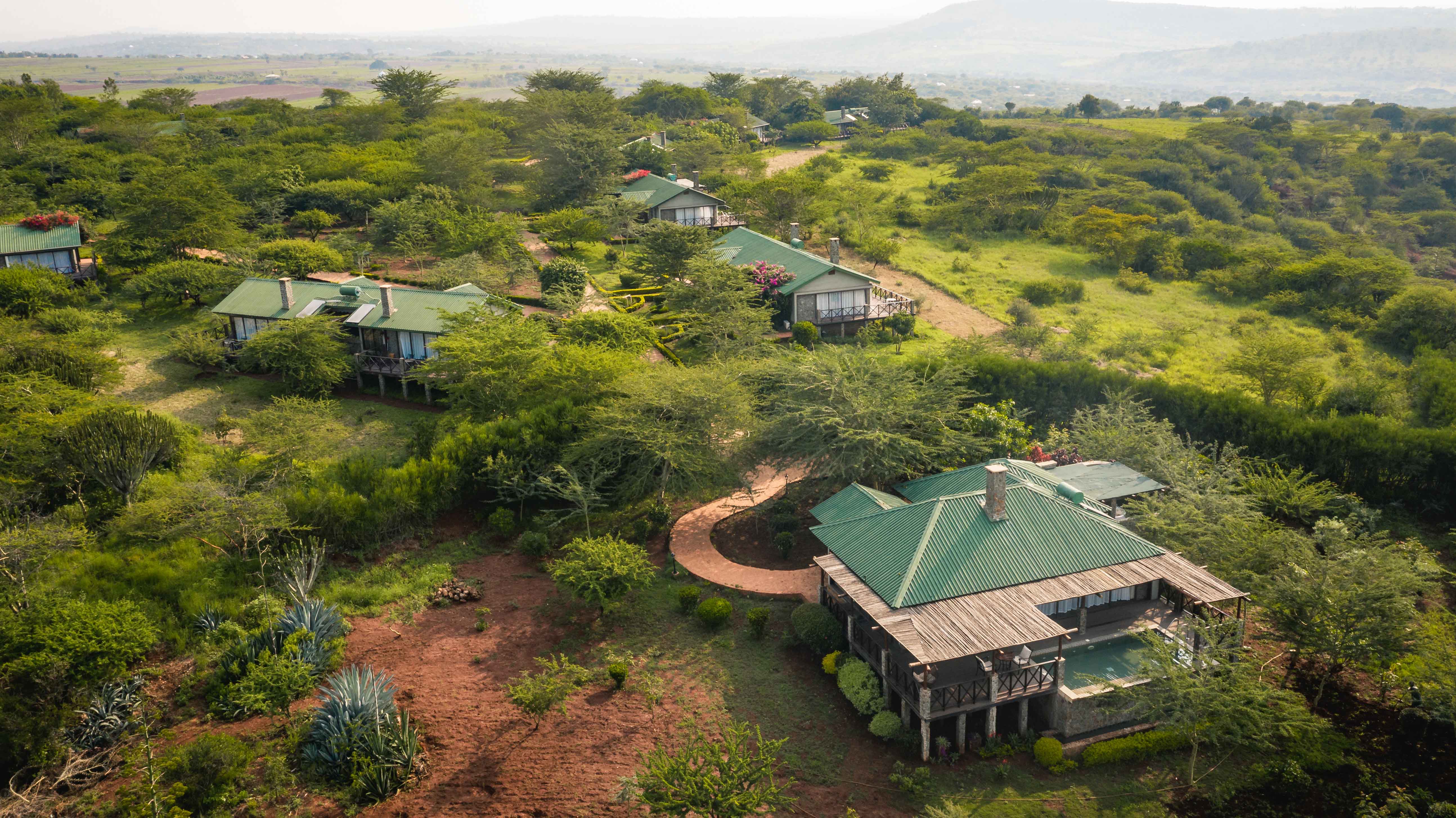 Manicured gardens and pathways within the 40-acre estate of the lodge