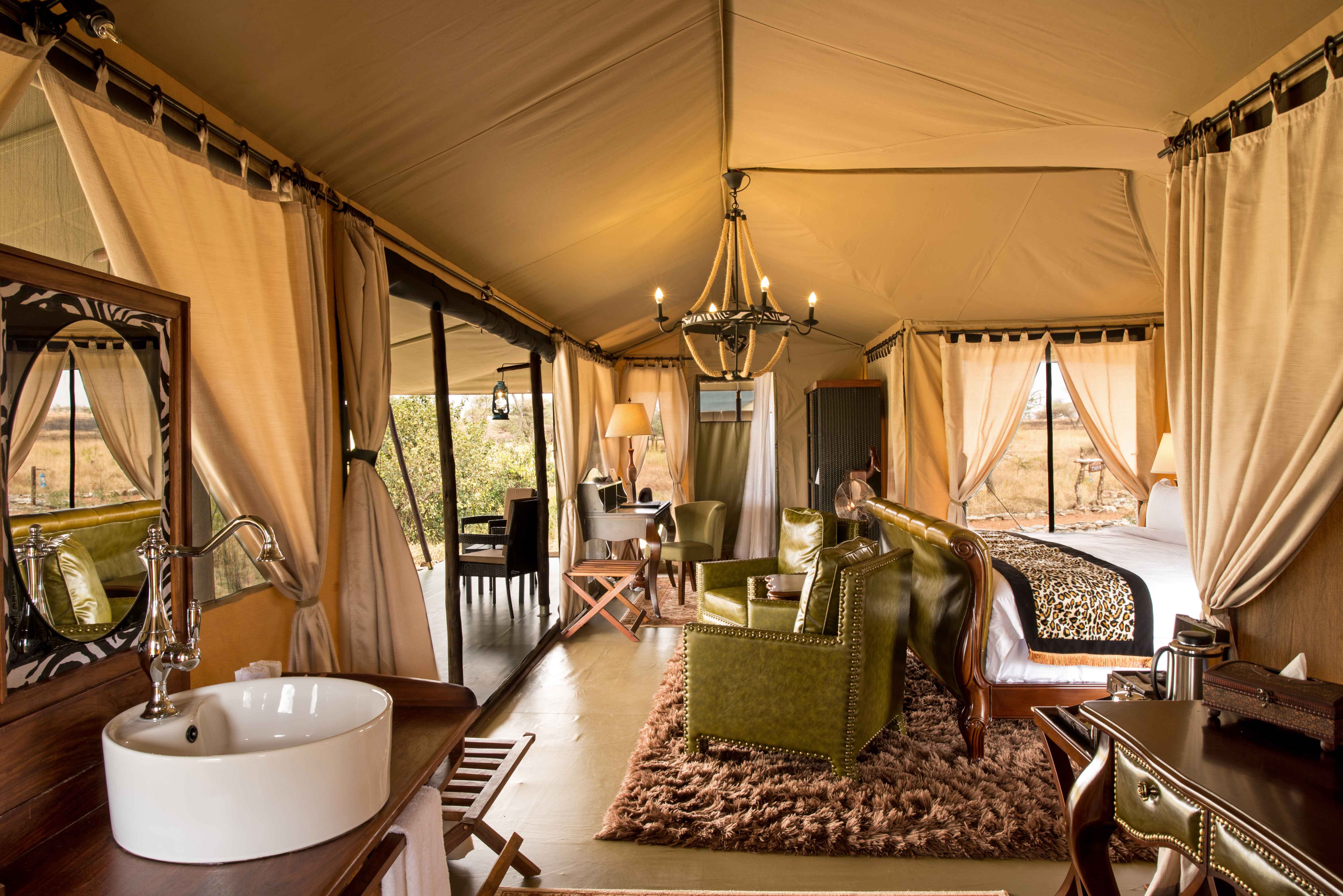 Elegant interior of a safari tent at Ole Serai Luxury Camp, Turner Springs