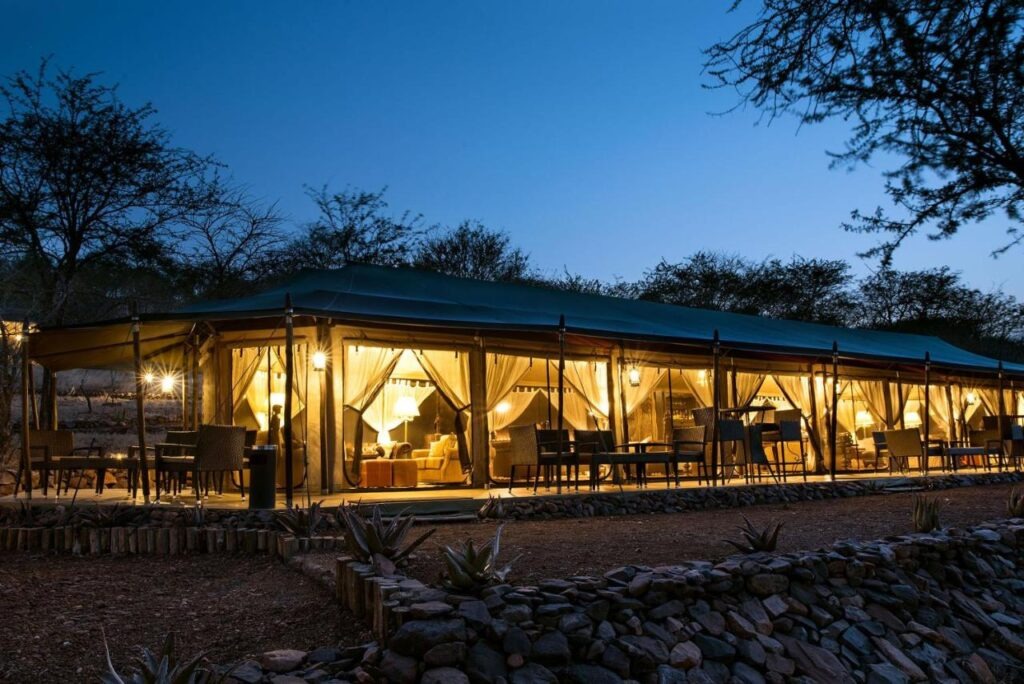 Camp lounge area with panoramic views of the Serengeti landscape