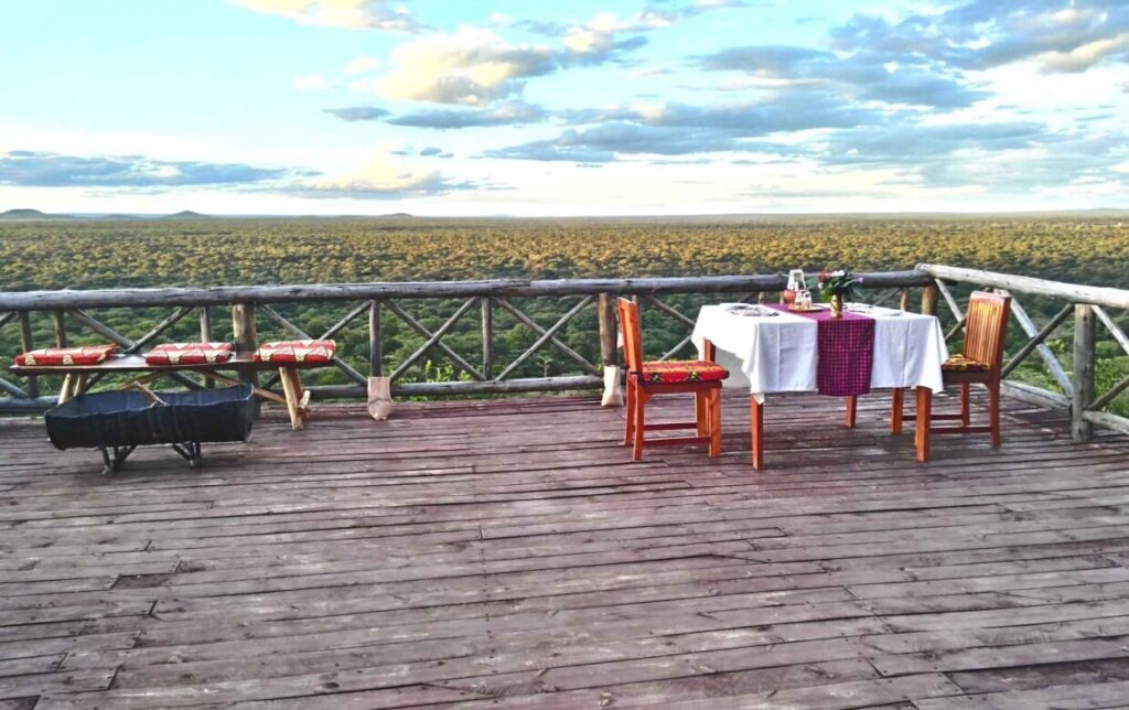The swimming pool area at Ruaha Hiltop Lodge, possibly with scenic backdrop
