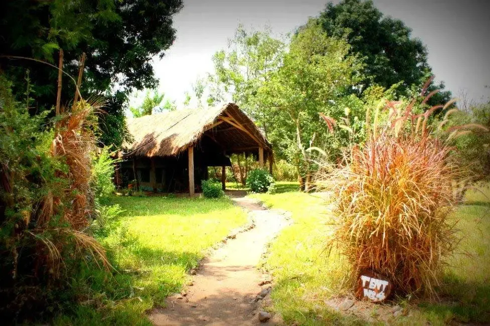Comfortable interior of a tented chalet at Udzungwa Forest Camp