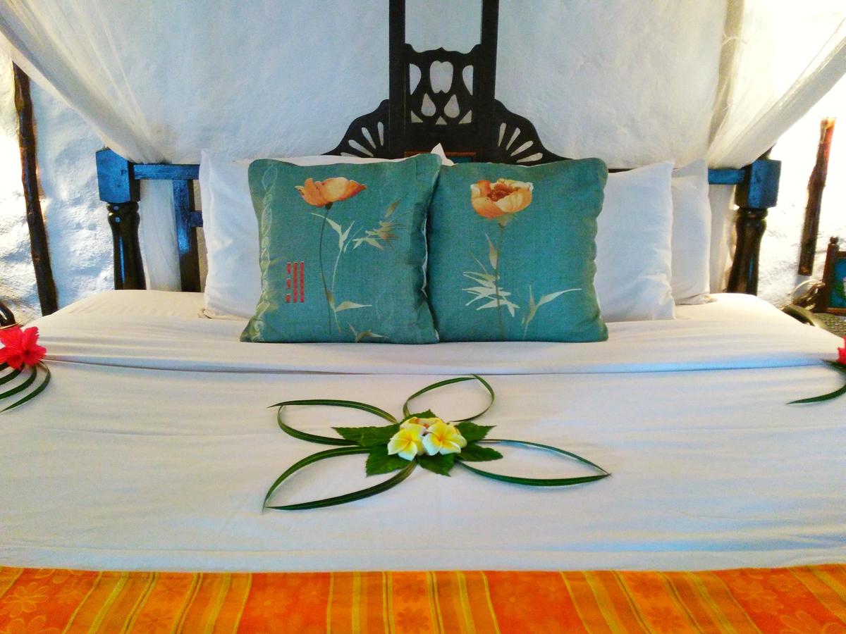 Manicured gardens of Zanzibar Beach Resort leading towards the beach