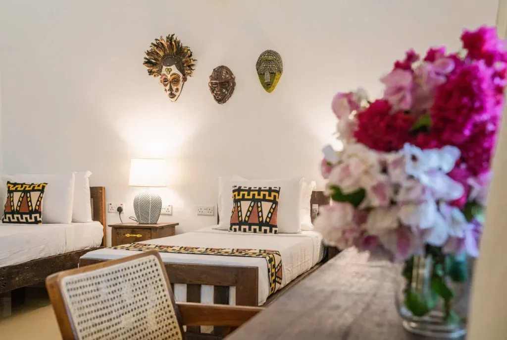 Guests walking through lush gardens or outdoor spaces at Zaraya