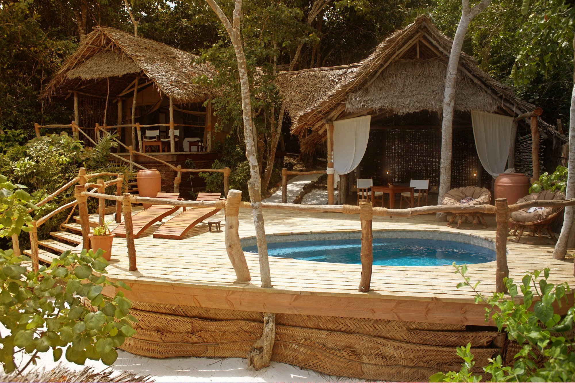 Interior of a luxurious tented suite with ocean view at Fundu Lagoon