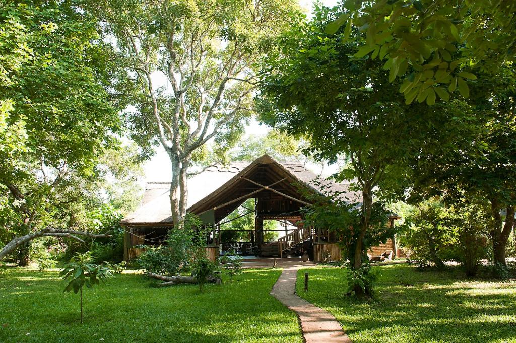 Interior of a comfortable chalet at Selous Kinga Lodge with natural touches