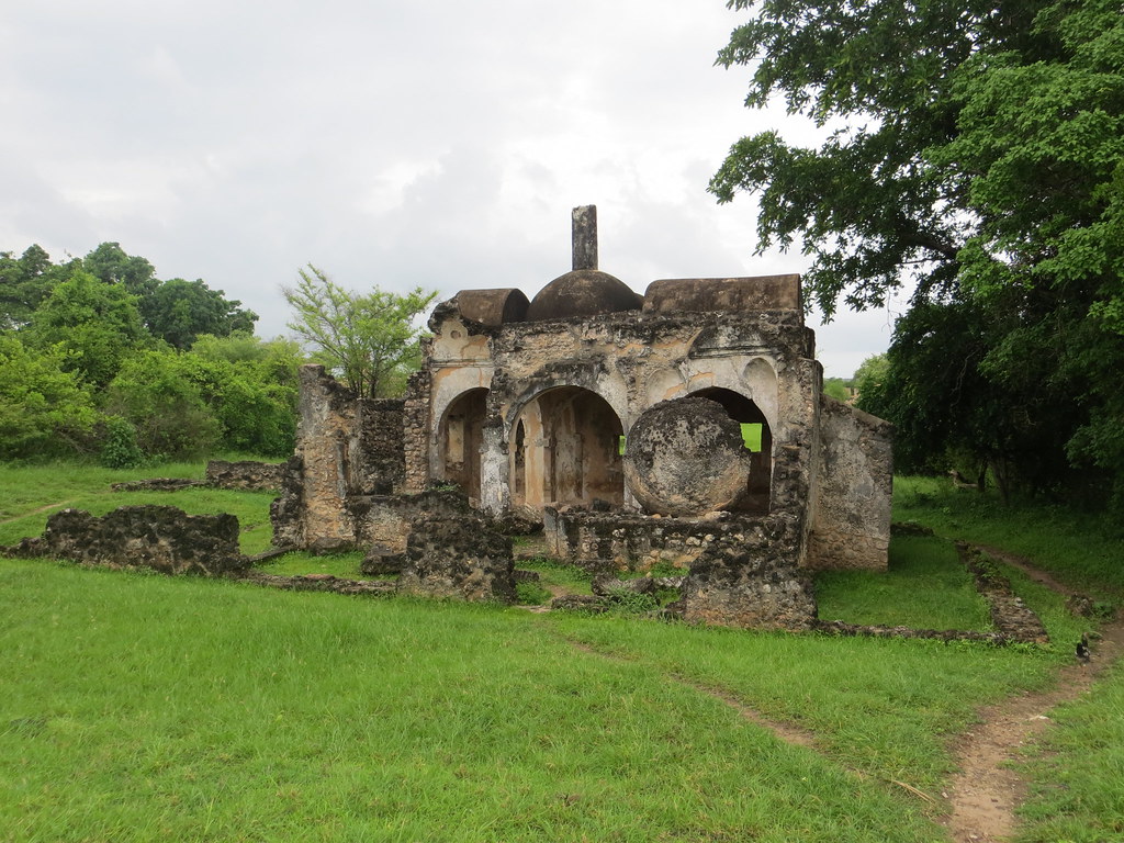 Arches and stone structures of the Husuni Kubwa palace ruins at Kilwa Kisiwani.